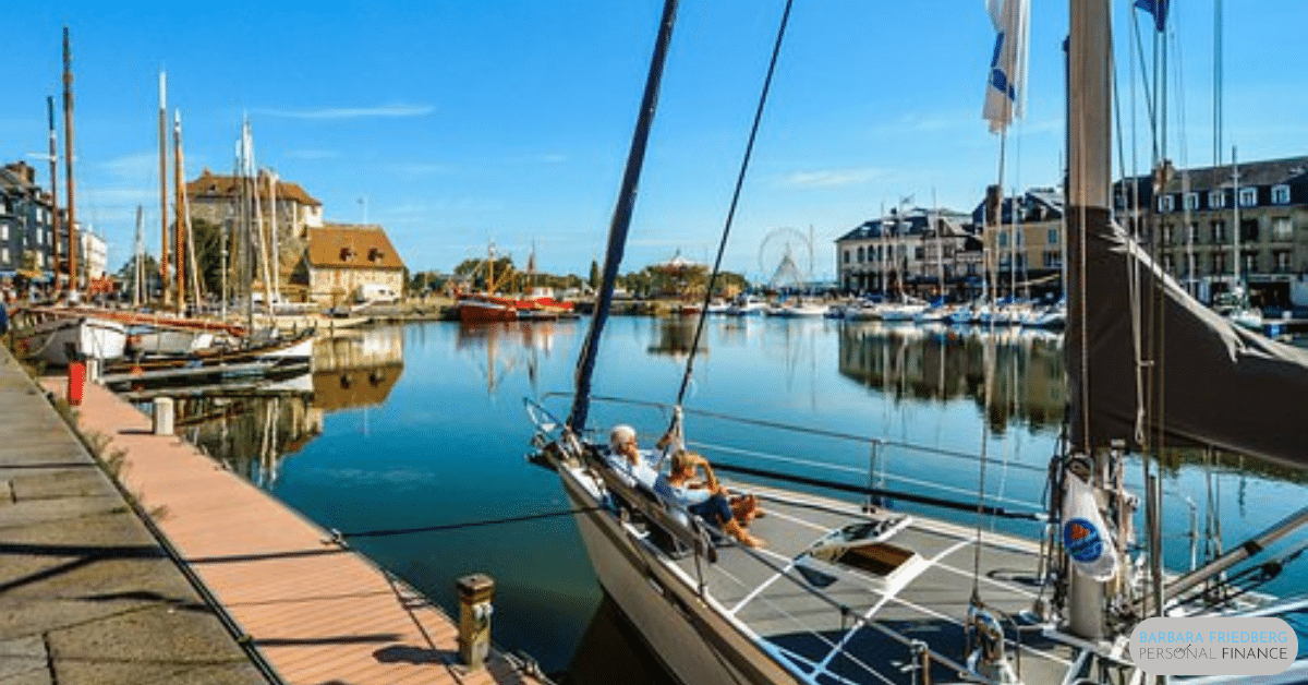 yacht in the sea with 2 retirees enjoying retirement - retirement planning tips